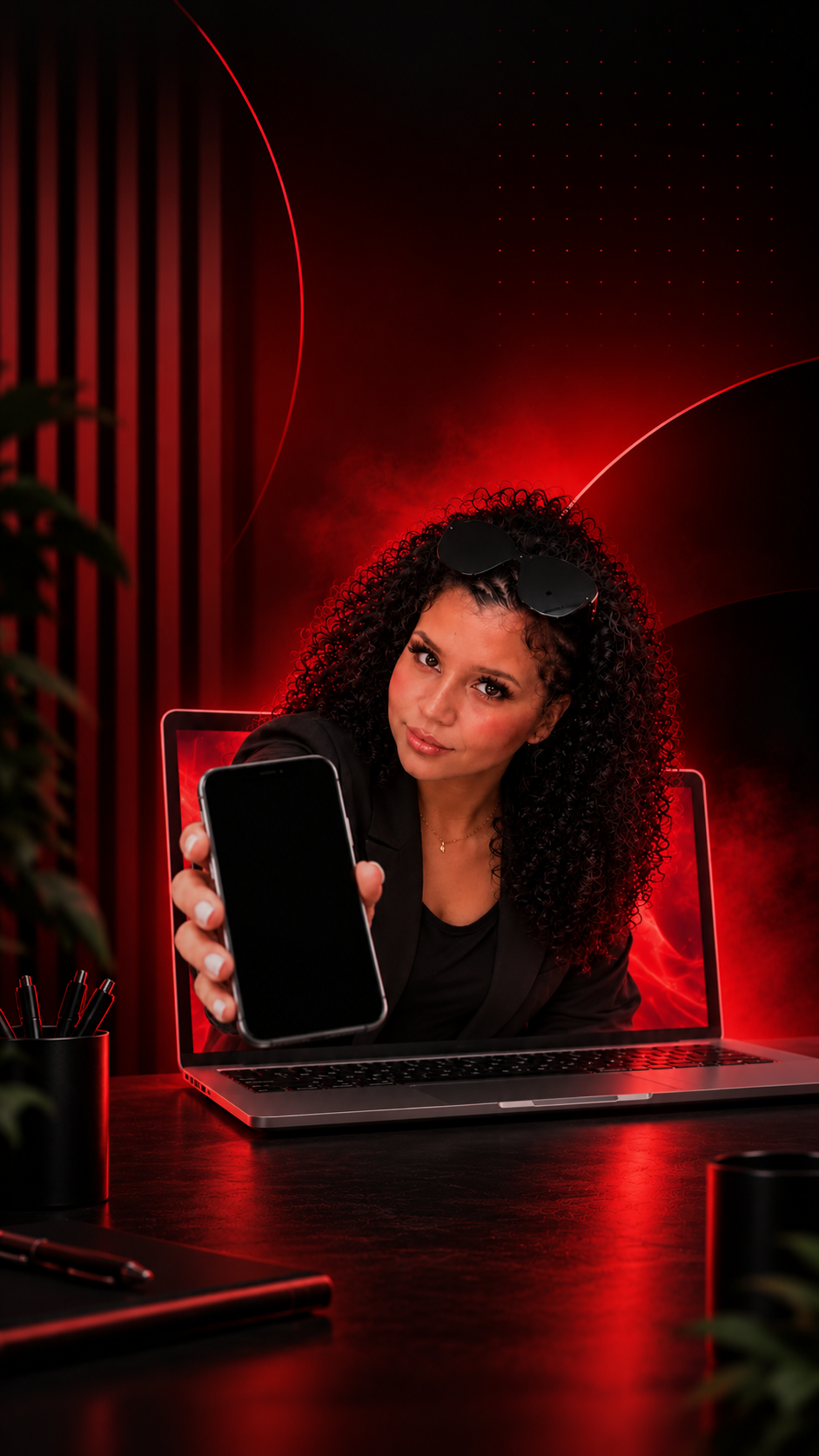 Selena emerging from laptop holding phone toward viewer